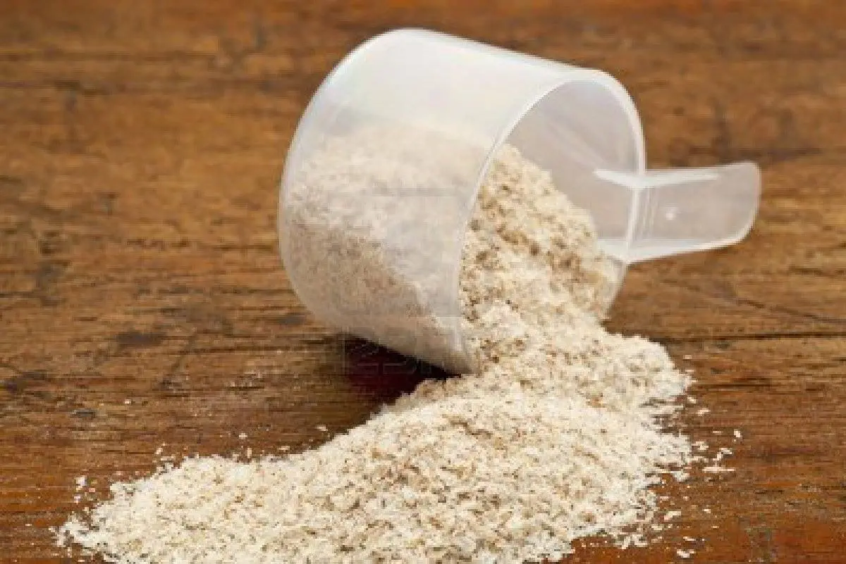 13927264-psyllium-seed-husks-dietary-supplement-source-of-soluble-fiber-measuring-scoop-over-grunge-wood-bac_20140307104926