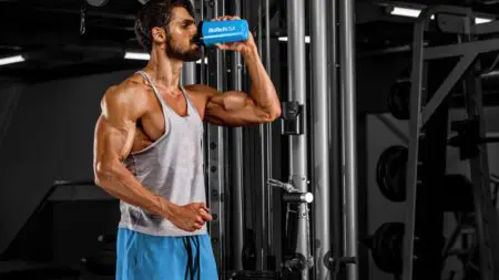 muscular-men-drink-his-nutritional-supplement